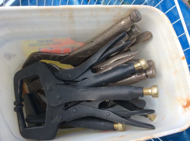 Bucket of vise grips