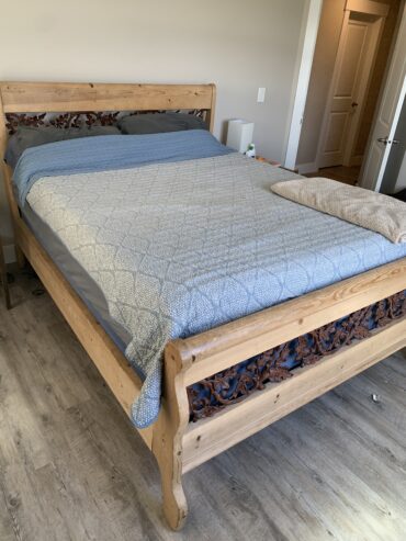 Beautiful wooden queen bed and box spring