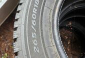 Les schwab 265x60x18 studded snow tire