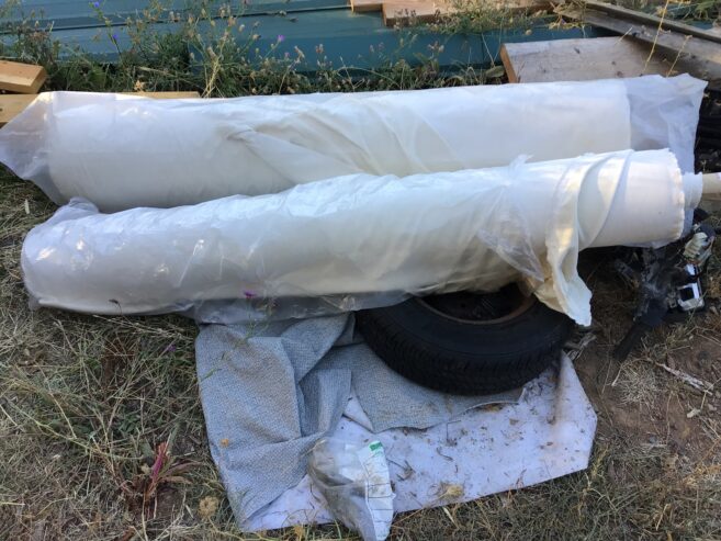 Two big rolls of canvas