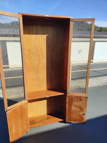 Solid, all wood, glass door cabinet.