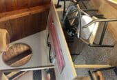 Wood and wicker dining chair at (4)