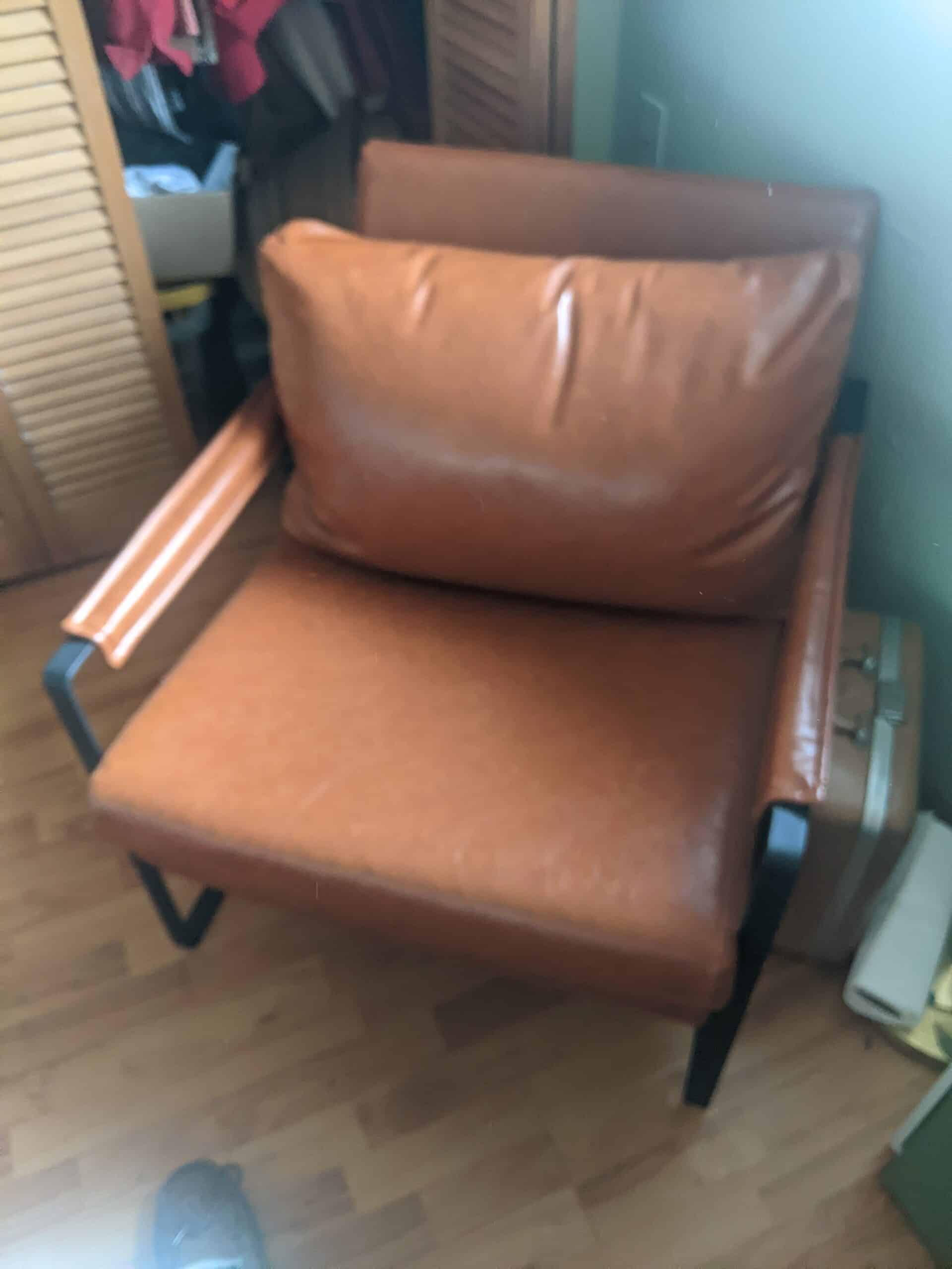 Glass end table, Naugahyde leather chair, white trunk