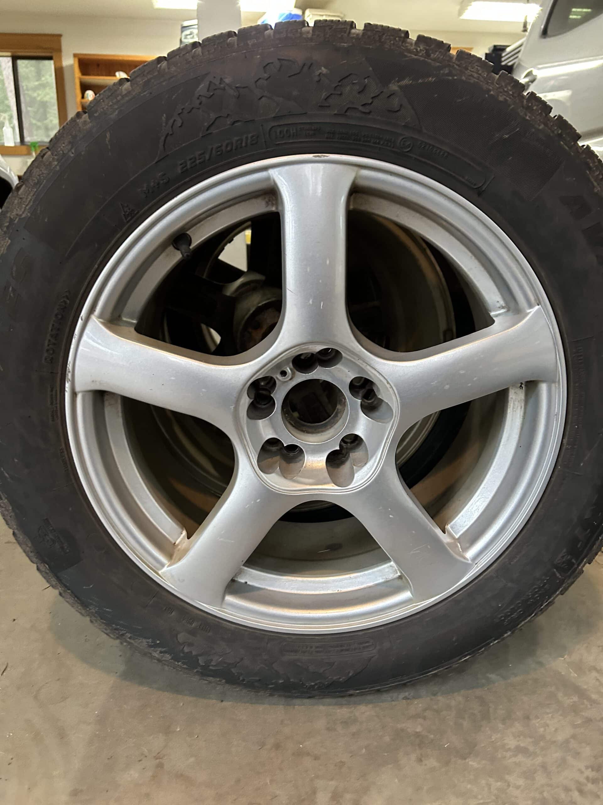 225/60/R18 mounted studded snow tires Subaru wheels