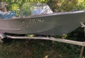 16′ aluminum boat with 70HP motor, trailer