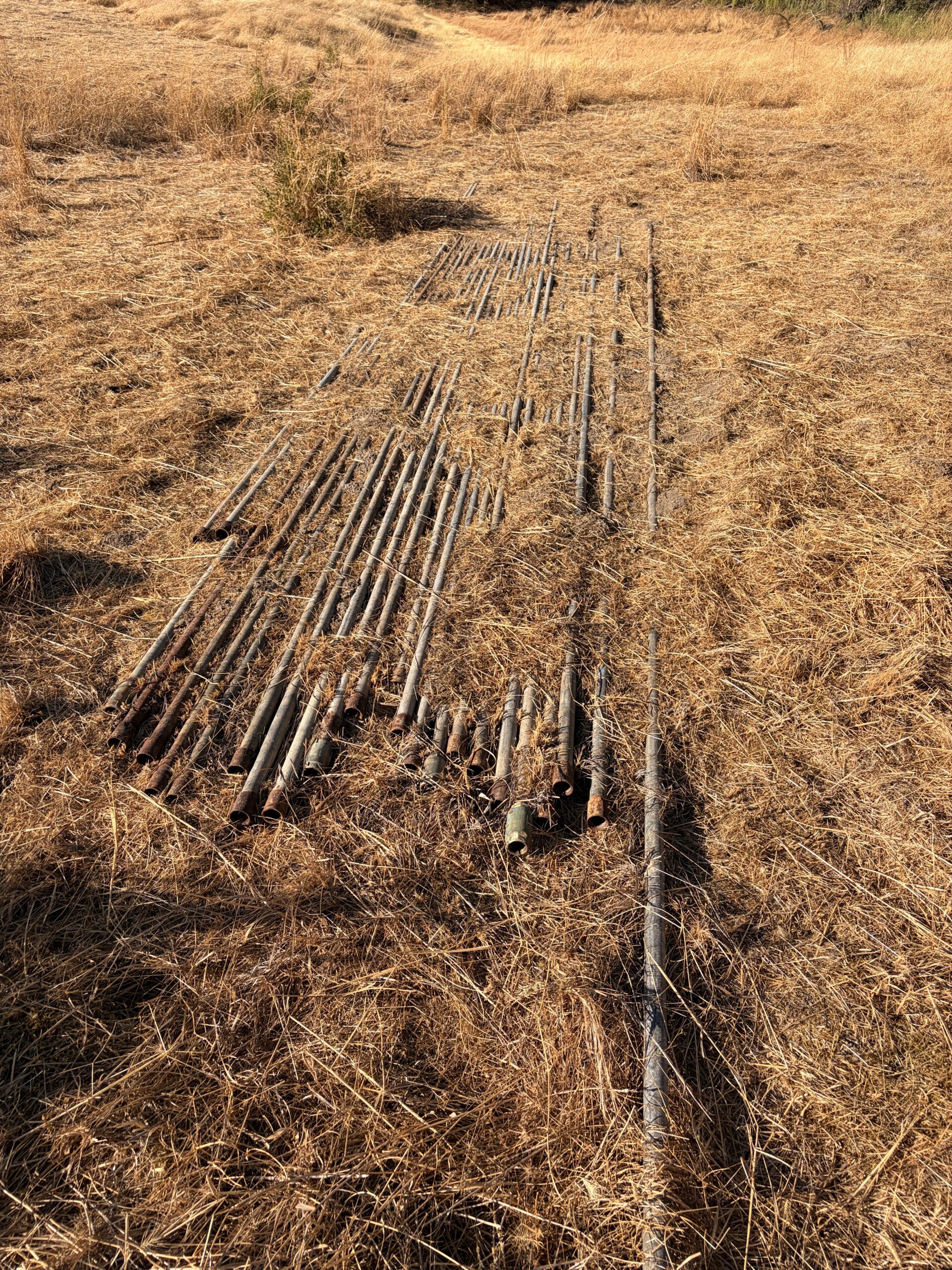 Old well pipes and electrical cable for pump