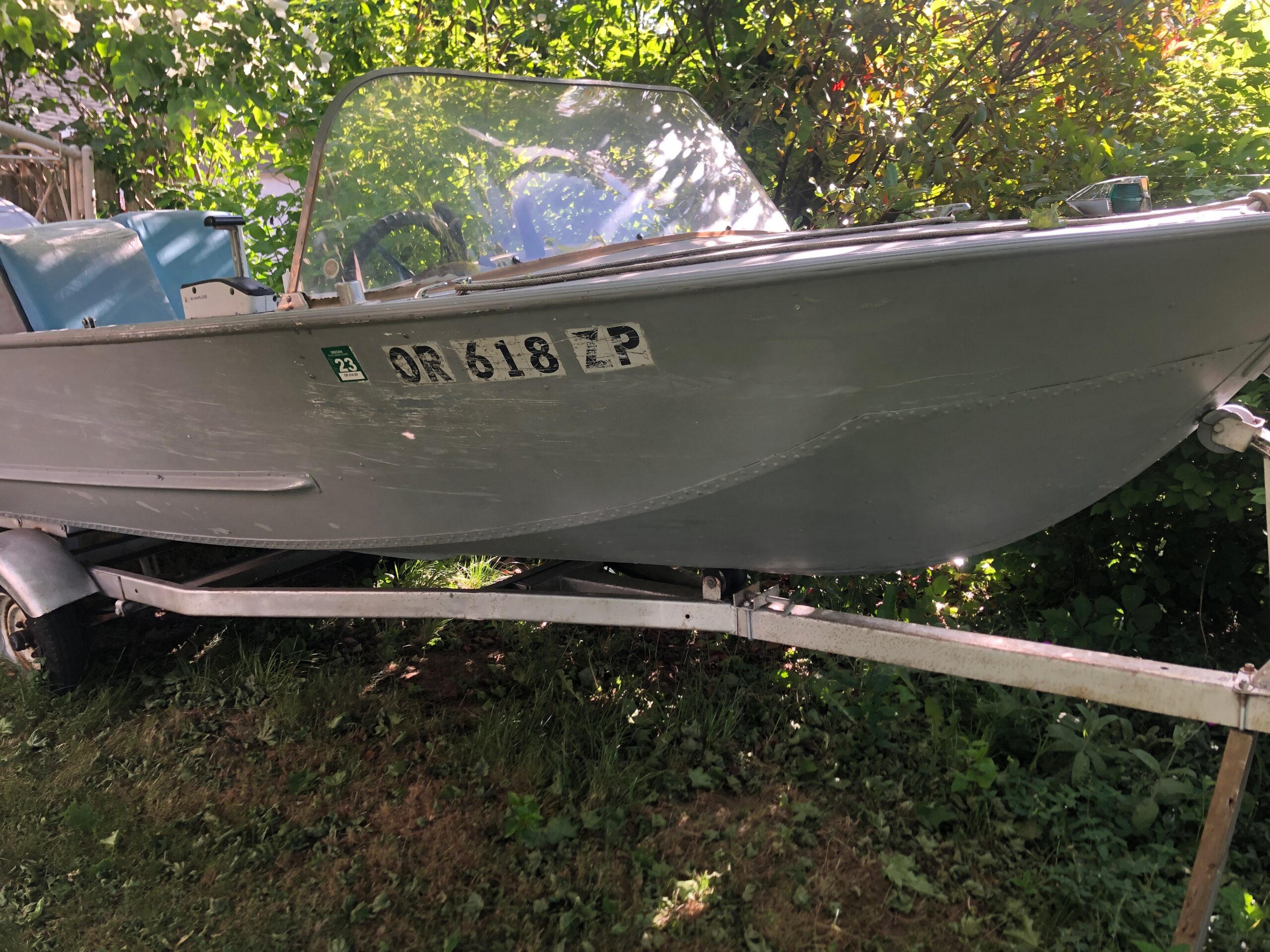 Auminum boat, motor and trailer